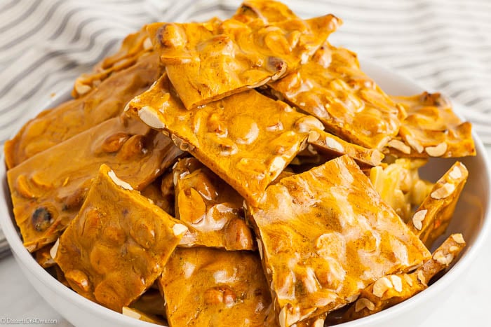 Learn how to make this simple and easy Homemade Peanut Brittle Recipe. Each bite is sweet and salty for a tasty treat everyone will love. Learn how to make this simple and easy Homemade Peanut Brittle Recipe. Each bite is sweet and salty for a tasty treat everyone will love.