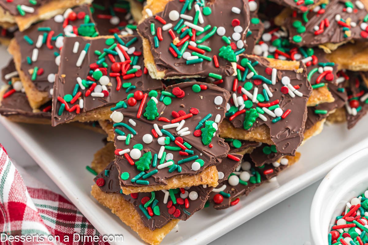 Christmas crack broken into pieces and served on a platter.