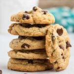The best Chocolate Chip Cookies stacked on top of each other.