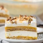 Pumpkin lasagna cut and served in squares.