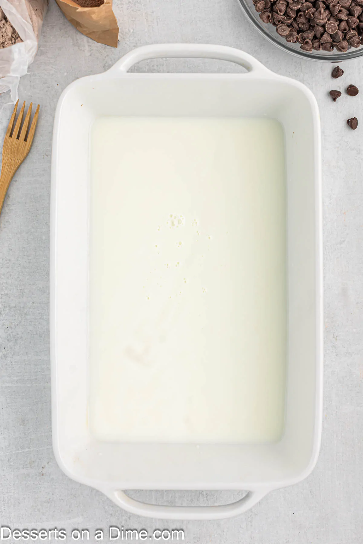 Baking dish with milk.