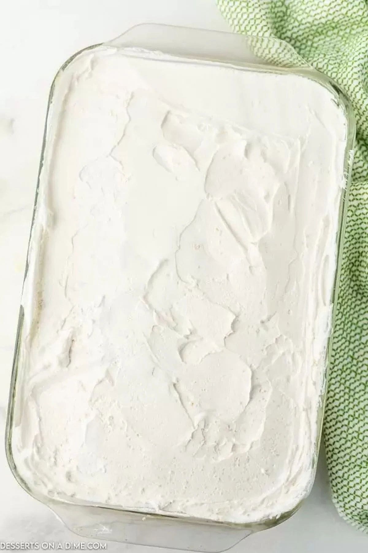 Cool whip spread on top of baking dish. 