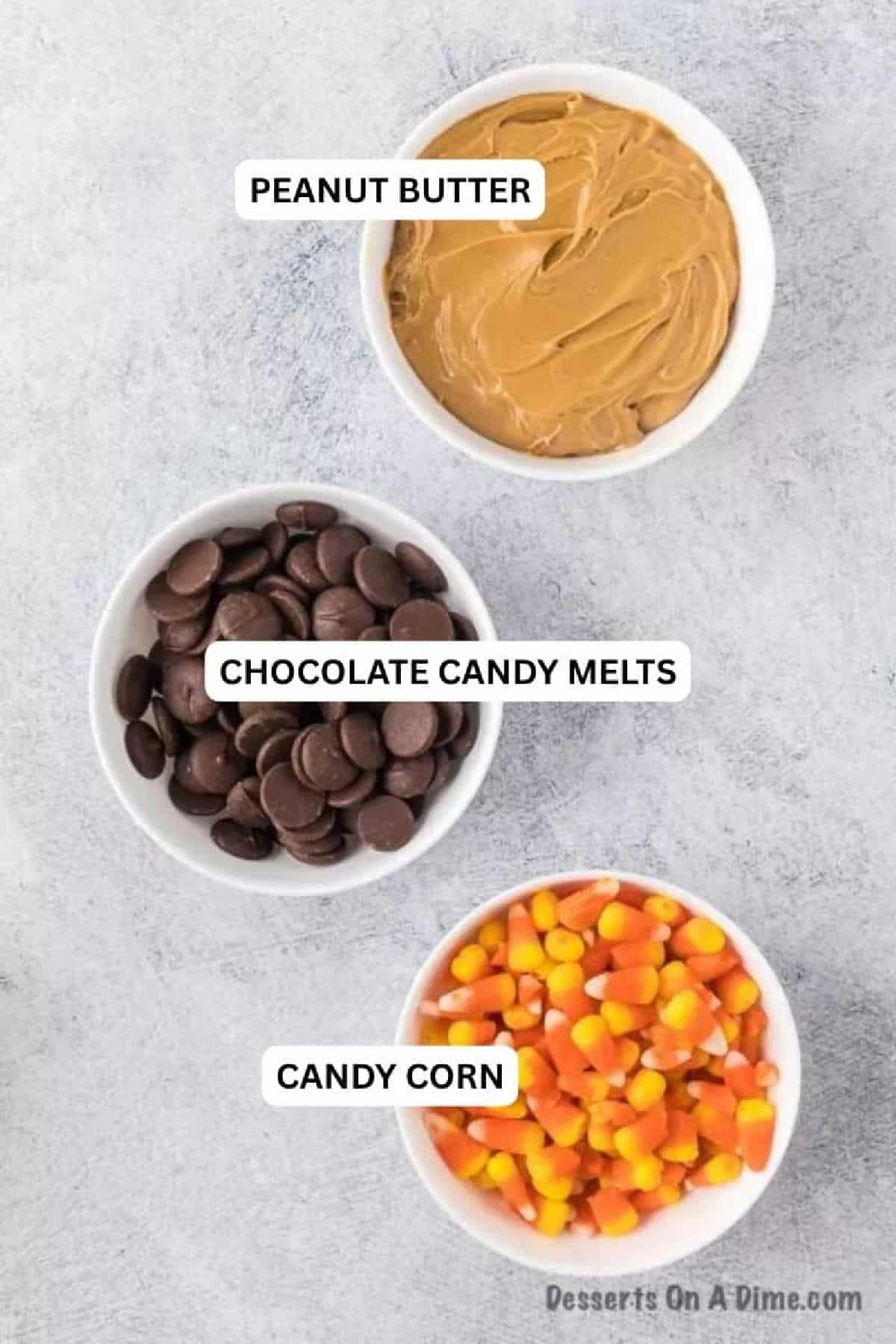Ingredients for recipe: peanut butter, chocolate wafers, candy corn. 