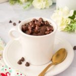 keto mug cake topped with chocolate chips.