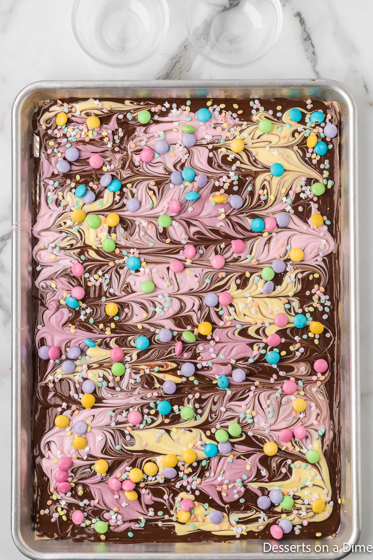 M&M candy sprinkled on top with sprinkles. 