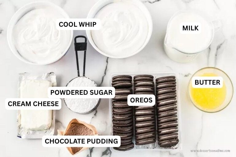 Ingredients for recipe: butter, oreos, powdered sugar, cream cheese, chocolate pudding, cool whip and milk. 