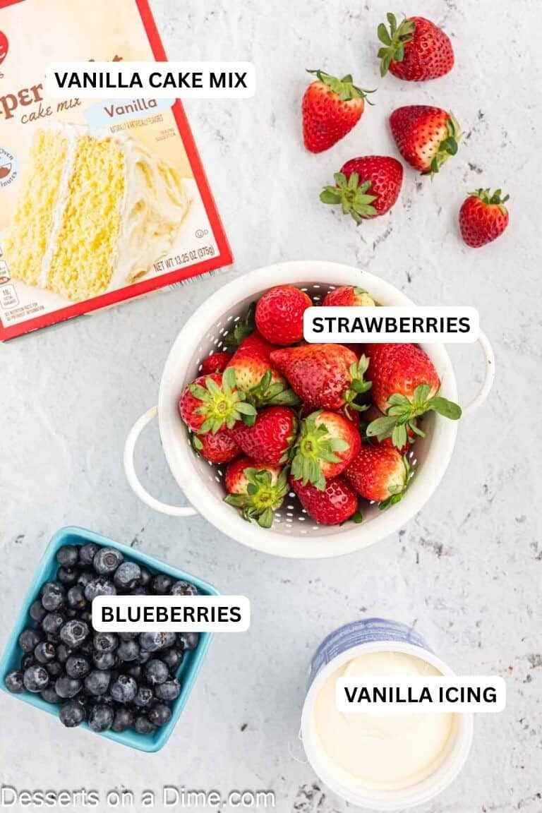 Ingredients for recipe: vanilla cake mix, strawberries, blueberries and vanilla icing.