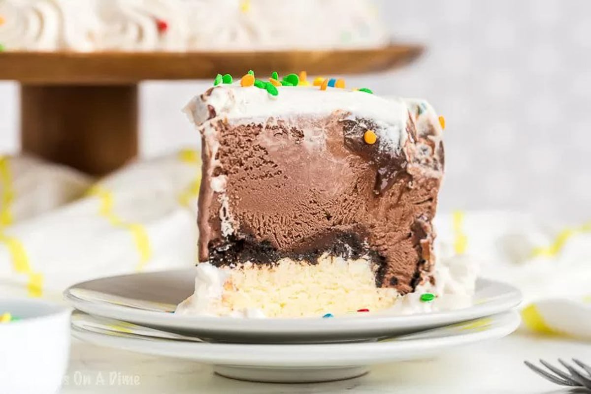 Slice of Dairy Queen Ice Cream Cake on a white plate. 