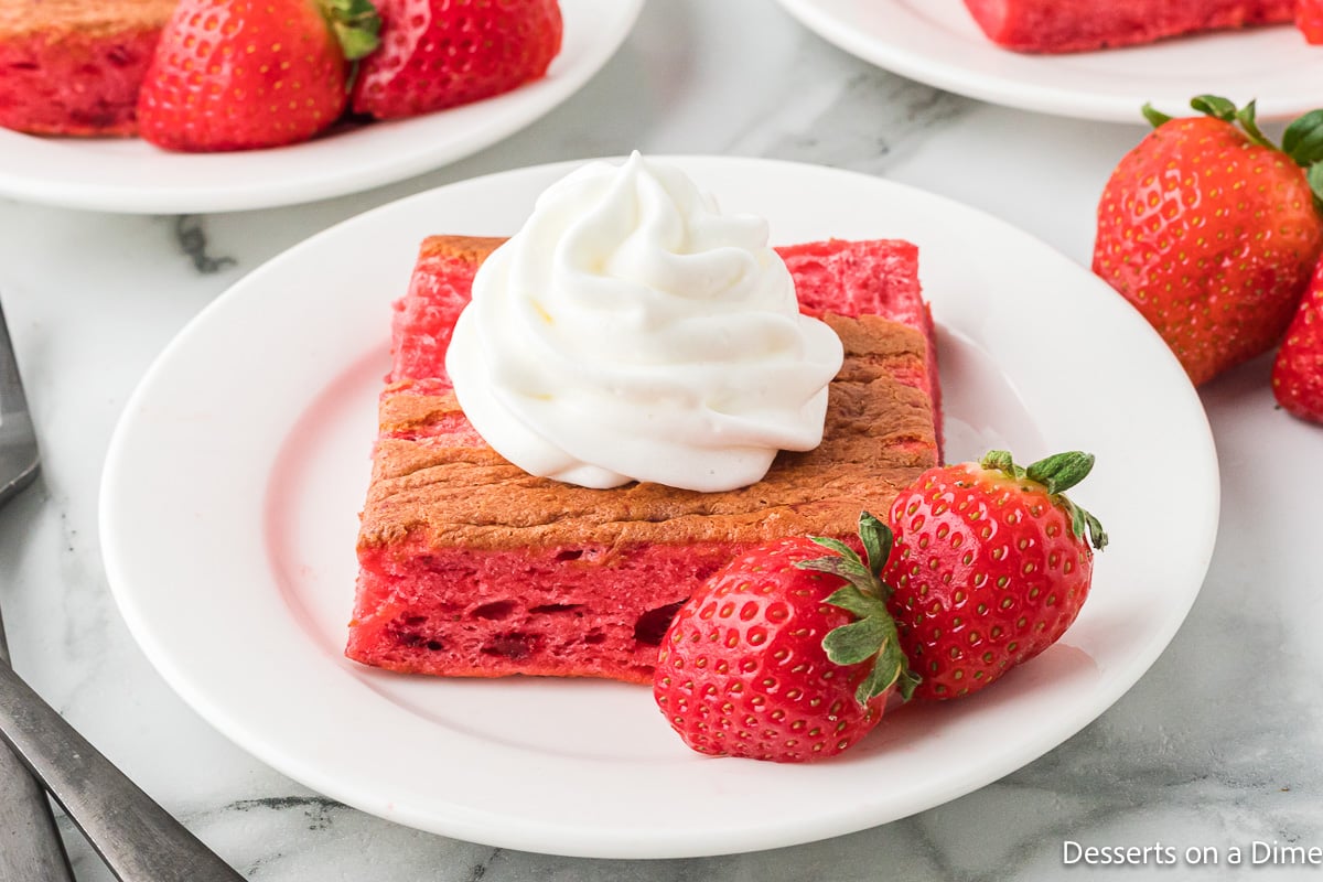 Strawberry Angel Food cake with whipped cream and strawberries. 
