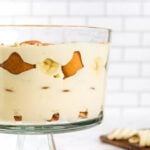 Close up image of banana pudding in a trifle dish