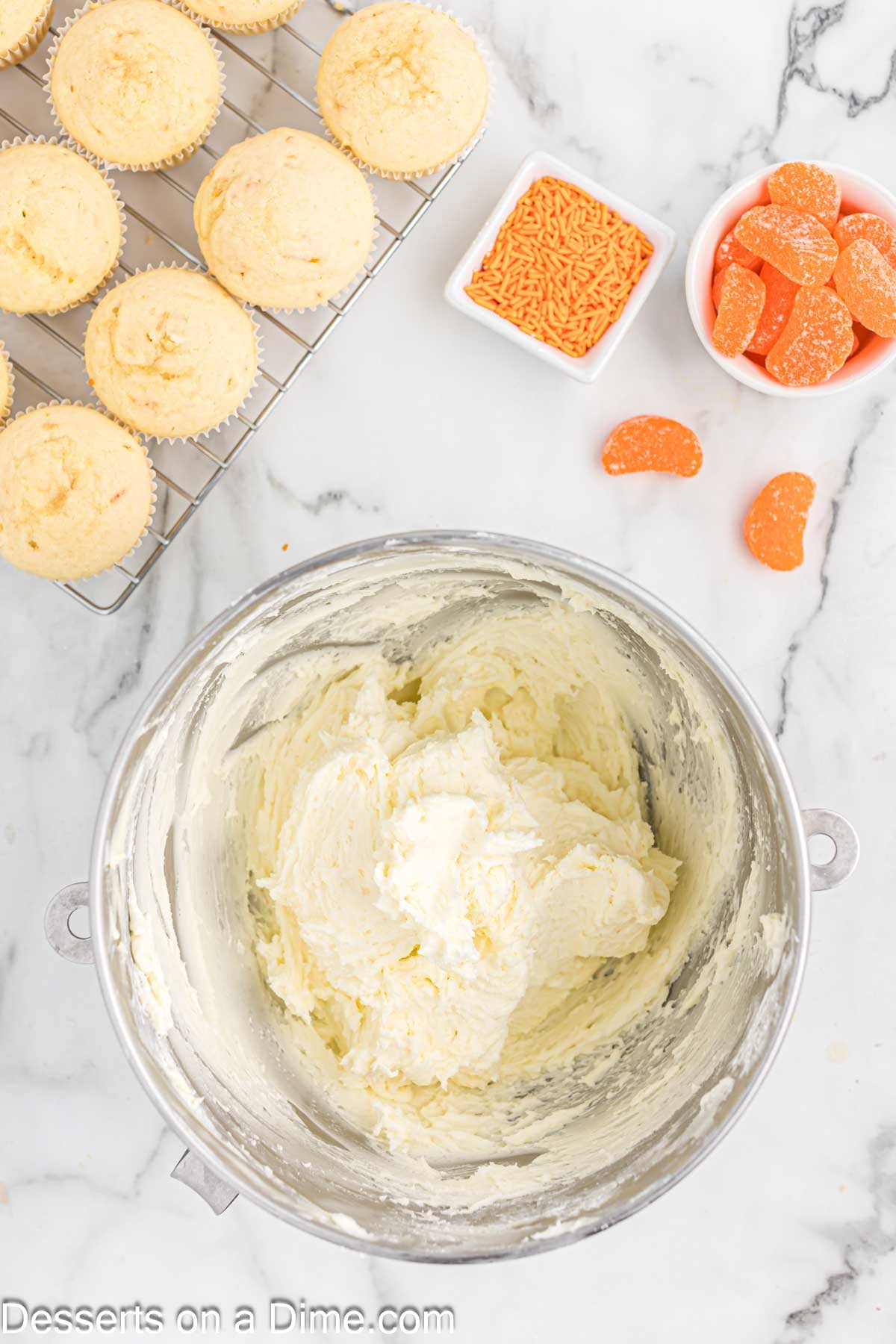 Powdered sugar added to bowl and combined for frosting. 