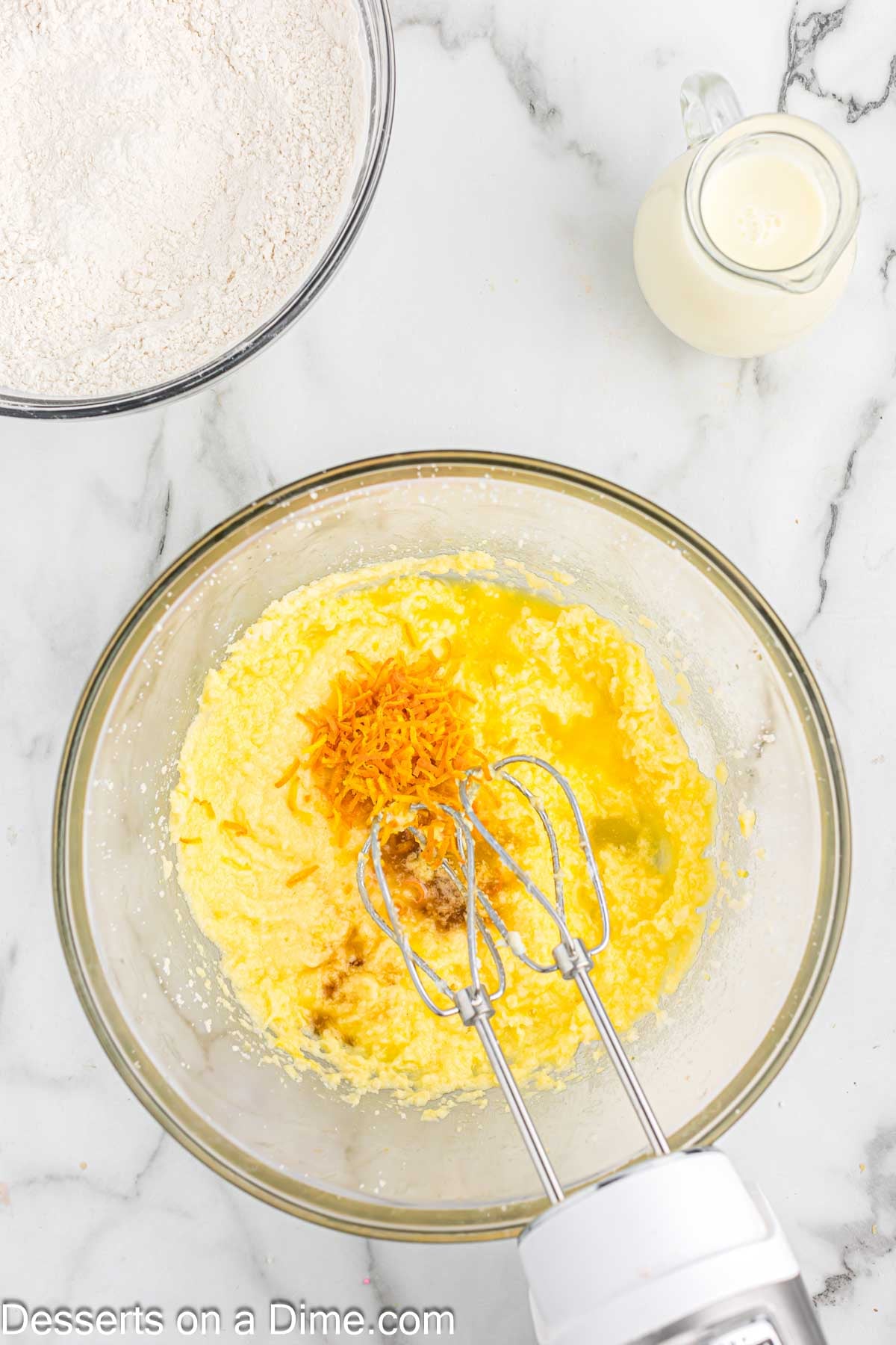 Bowl with eggs added to mixture. 