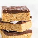 Close up image of Chocolate Peanut Butter Bars stacked