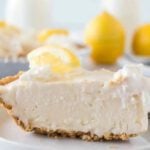 A slice of Lemon Icebox cake on a white plate