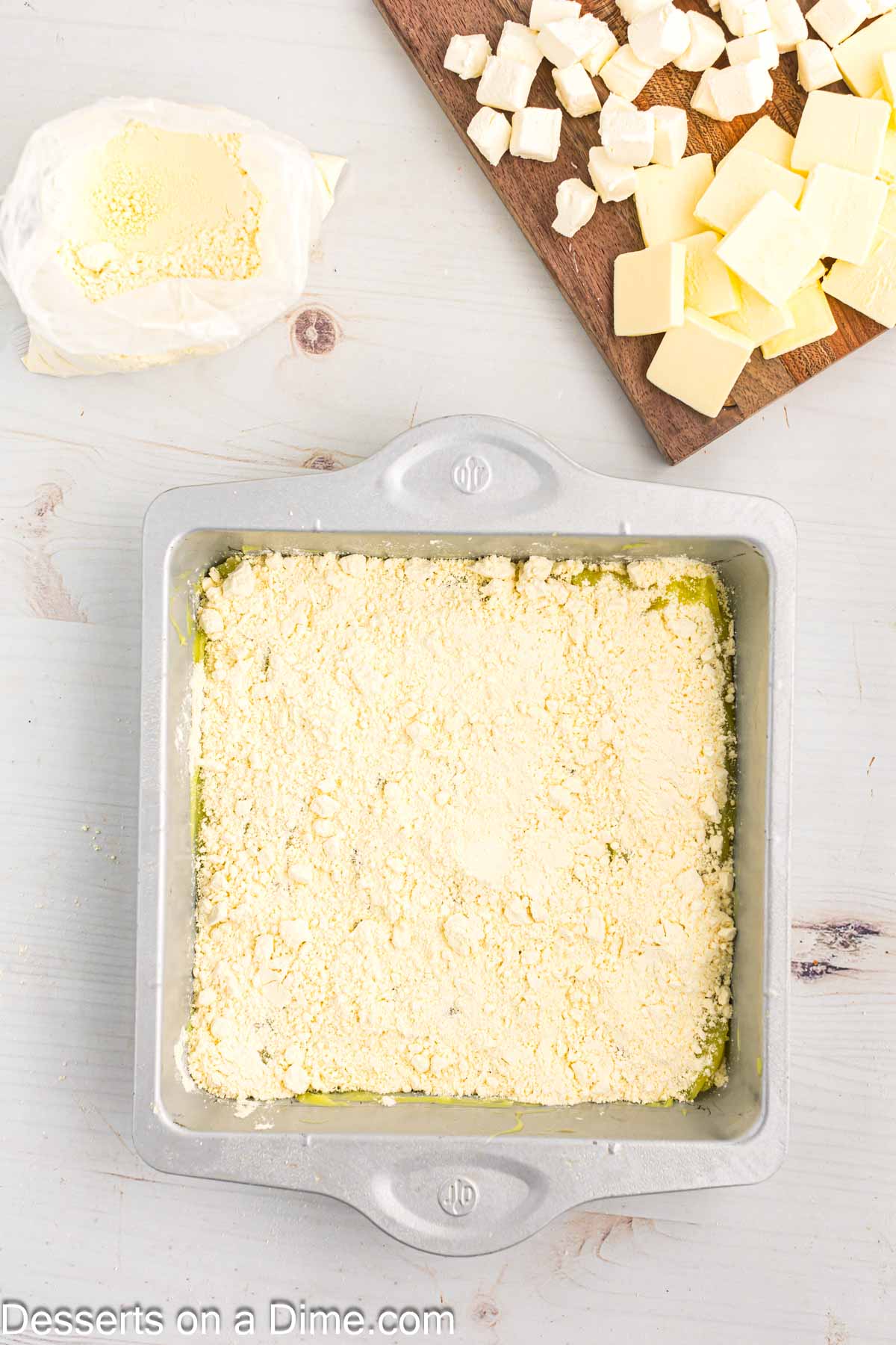 Cake mix sprinkled over pie filling. 