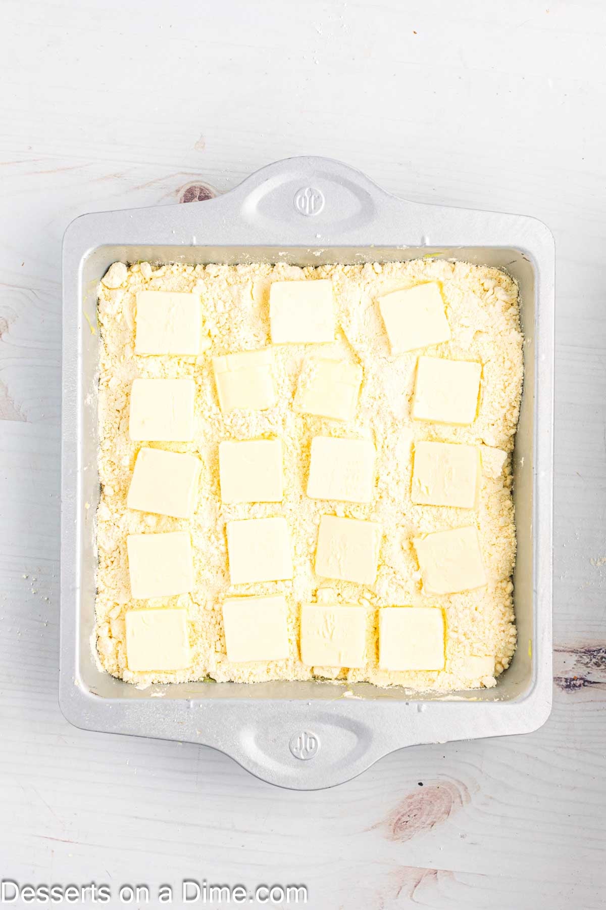 Butter slices spread on cake. 
