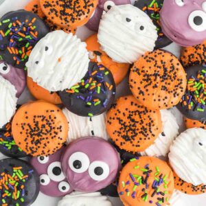 Halloween cookies on a plate with a white background.