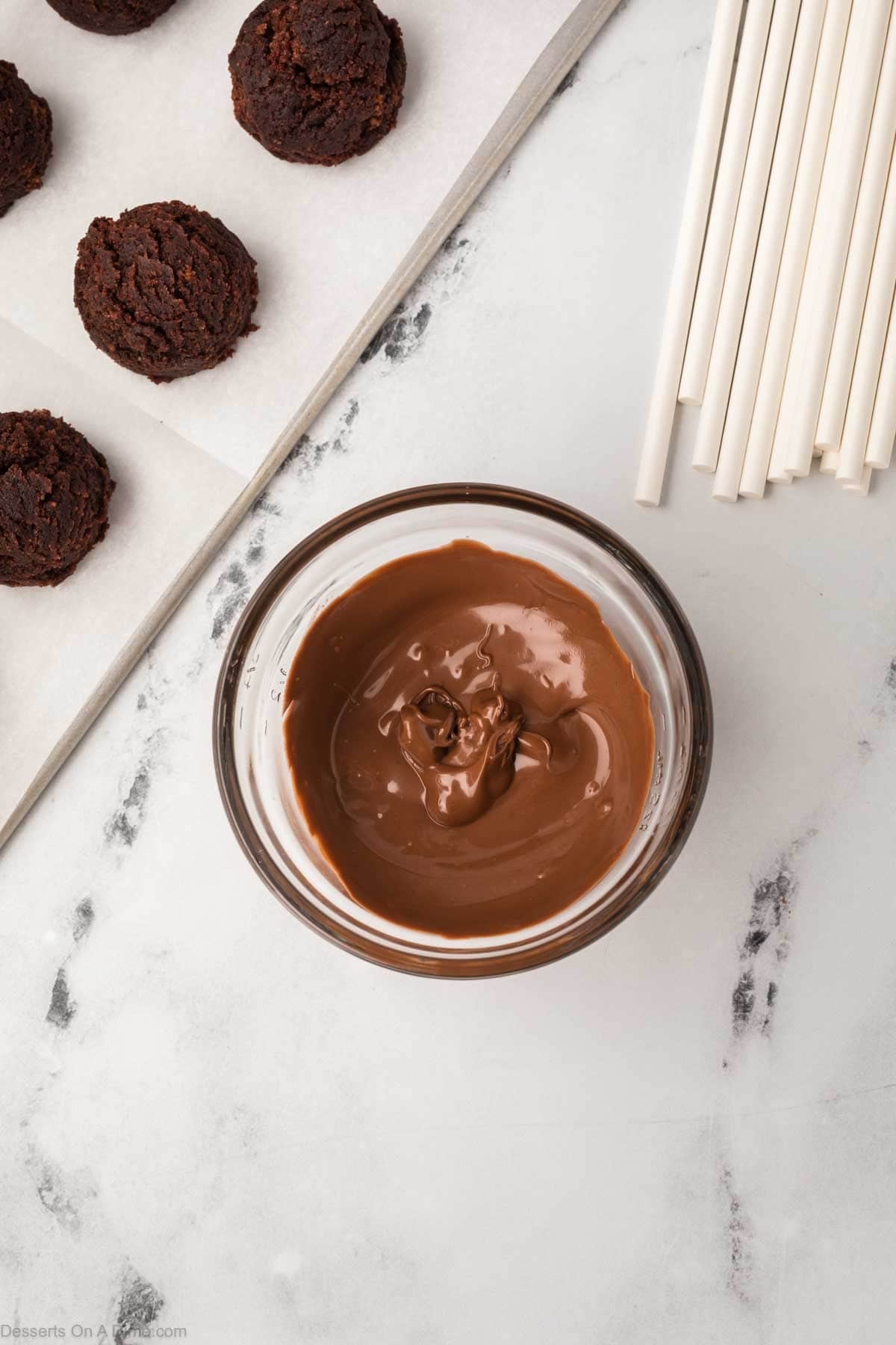 Chocolate melted in bowl. 