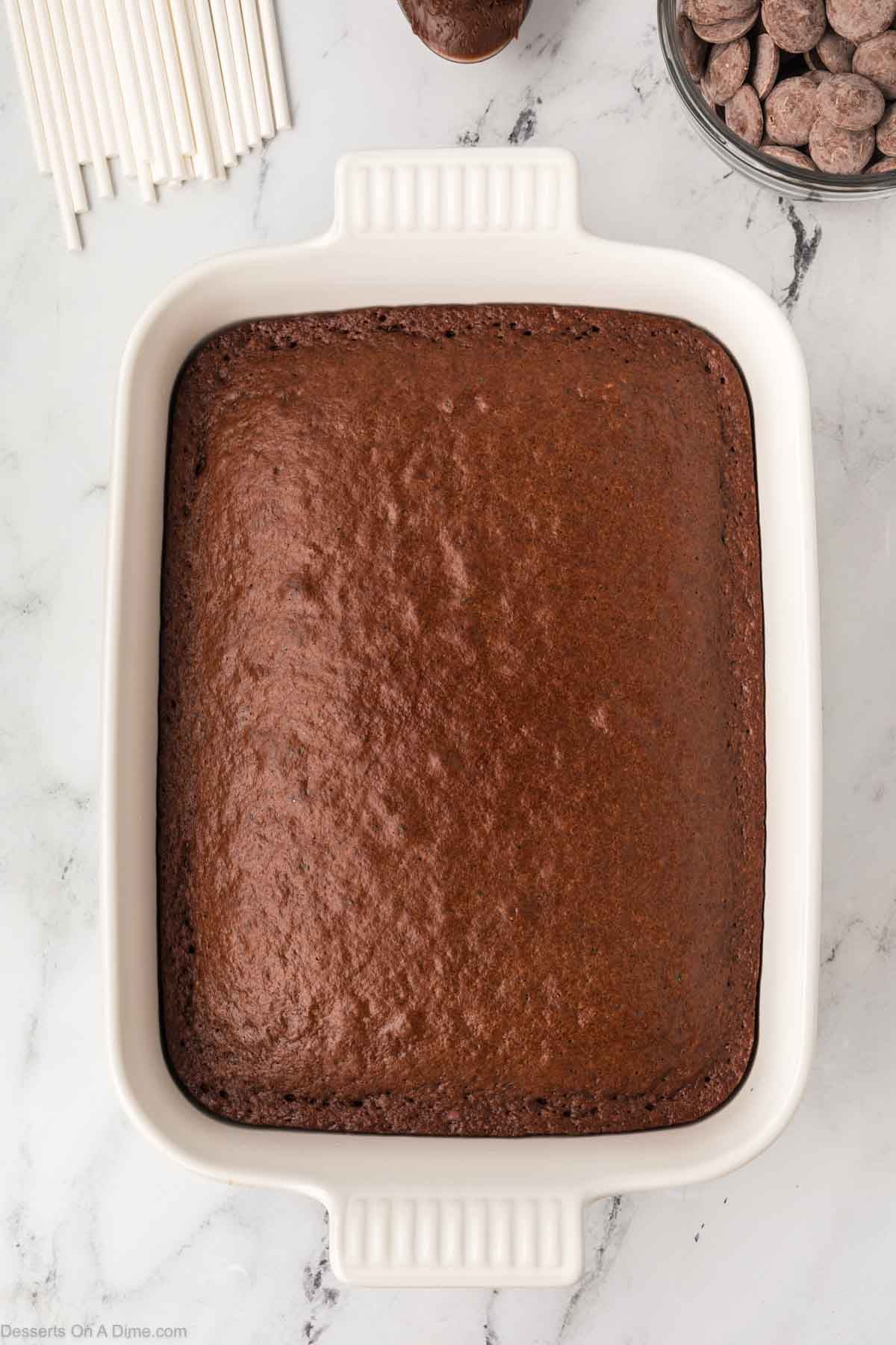Cake baked and cooling in pan. 