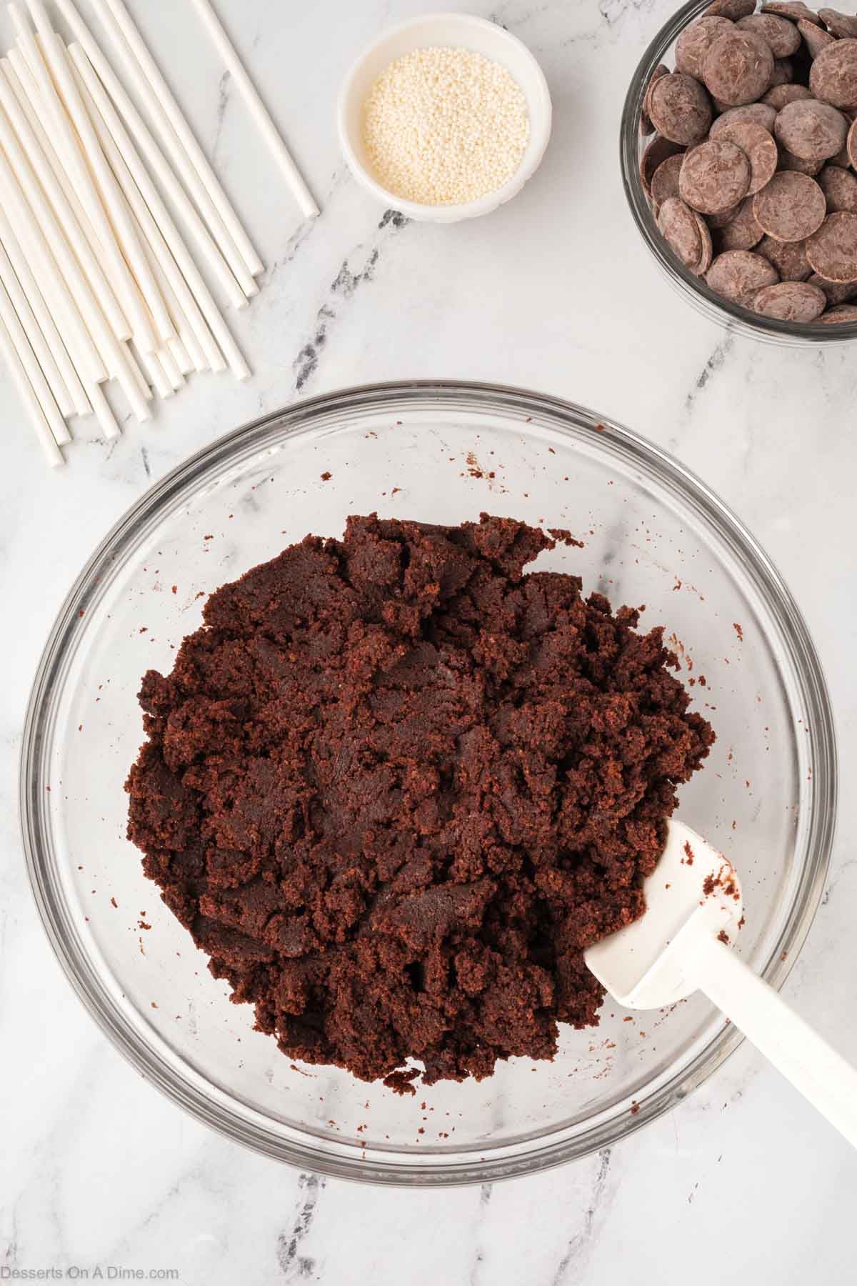 Cake and frosting combined in bowl. 