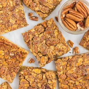 Sweet pecan pie bars with crunchy topping and caramel flavor, perfect for dessert or snack.