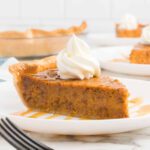 Slice of Caramel Pumpkin pie on a plate.