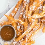 Funnel cake fries with caramel sauce.