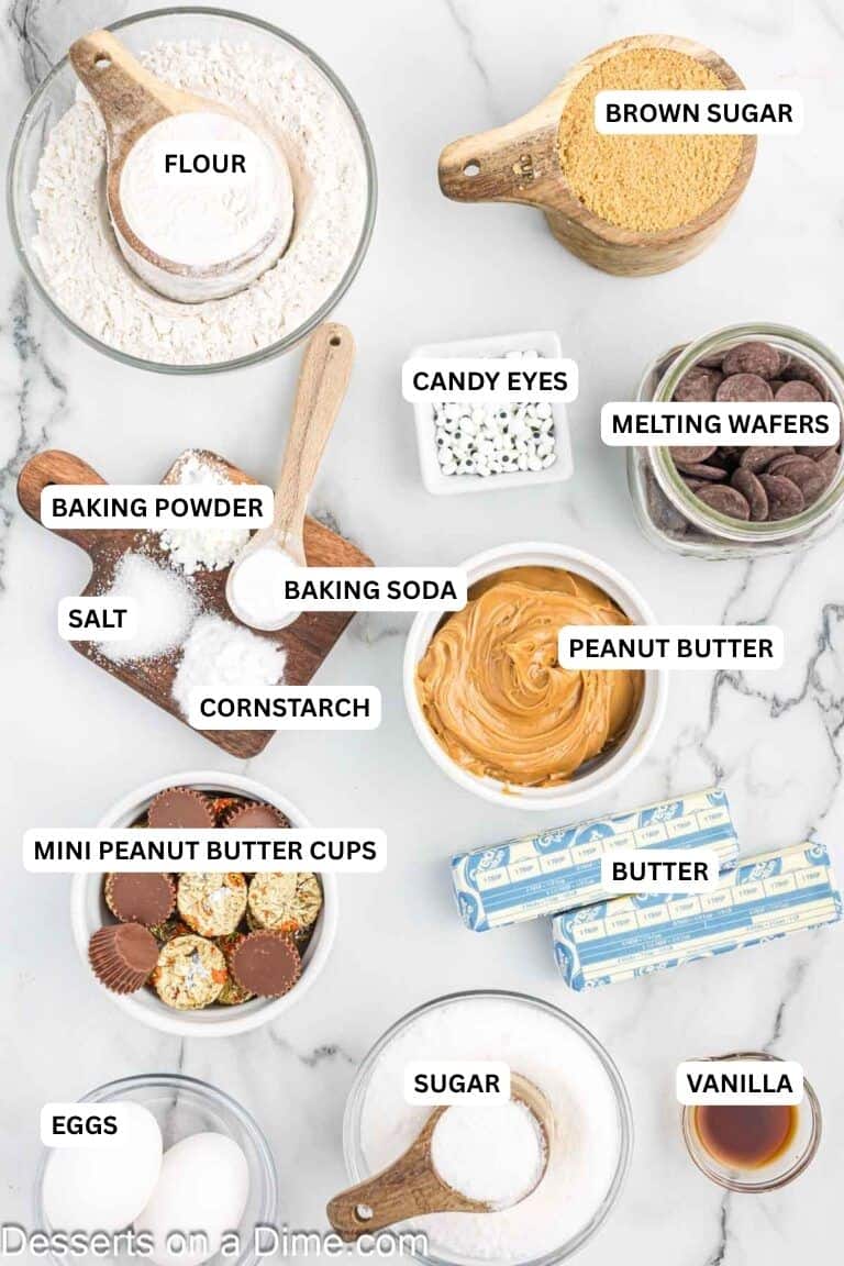 Ingredients for recipe: brown sugar, flour, candy eyes, melting wafers, baking soda, baking powder, salt, cornstarch, peanut butter, butter, mini peanut butter cups, eggs, sugar and vanilla. 