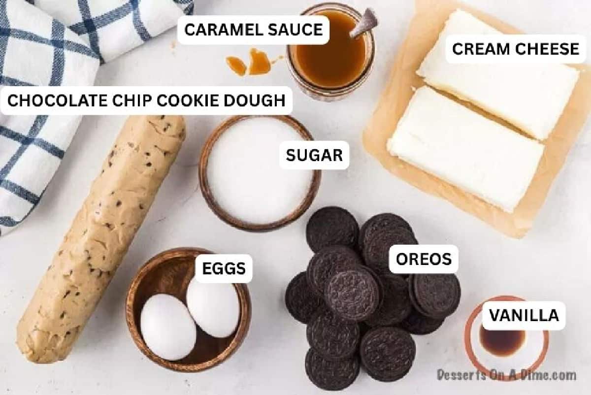 Ingredients needed for recipe: chocolate chip cookie dough, Oreos, cream cheese, sugar, eggs, vanilla and caramel.