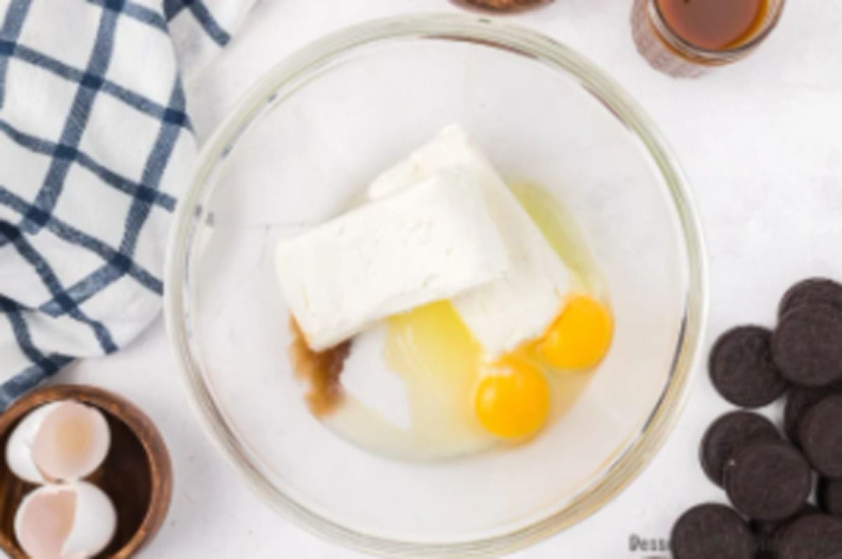Cream cheese, sugar, egg and vanilla combined in a bowl. 