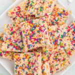 Cake Batter rice krispie treats stacked together.