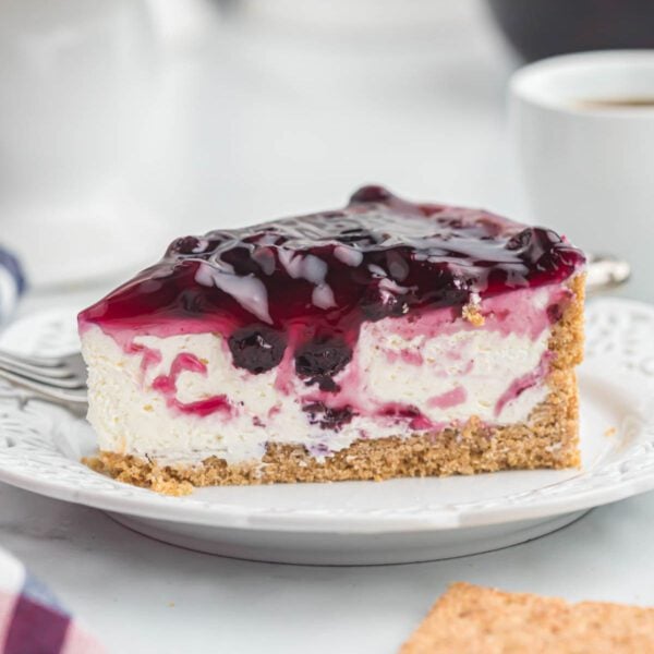 No bake blueberry cheesecake sliced.