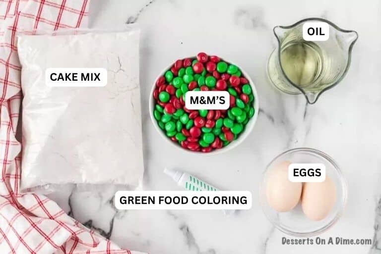Ingredients for recipe: cake mix, oil, M&M's, eggs and green food coloring. 
