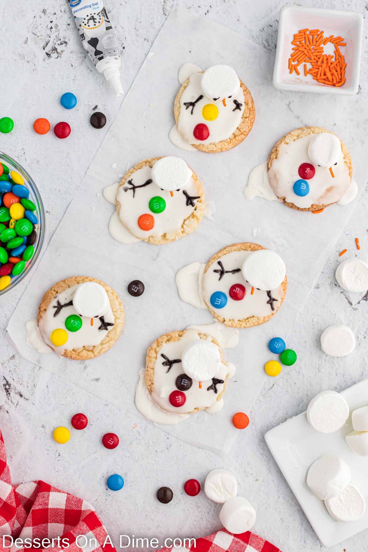 Black icing used to decorate and add arms. 