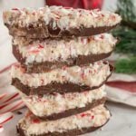 Stack of peppermint bark on a plate.