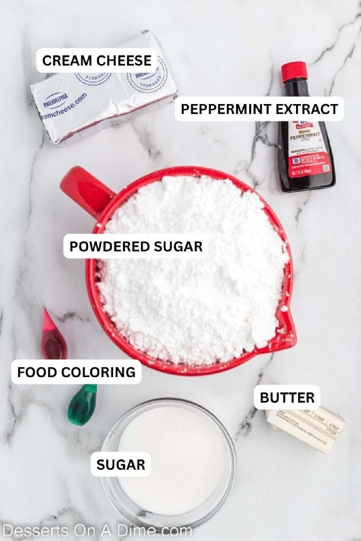 Ingredients for recipe: cream cheese, powdered sugar, vanilla, food coloring and butter. 