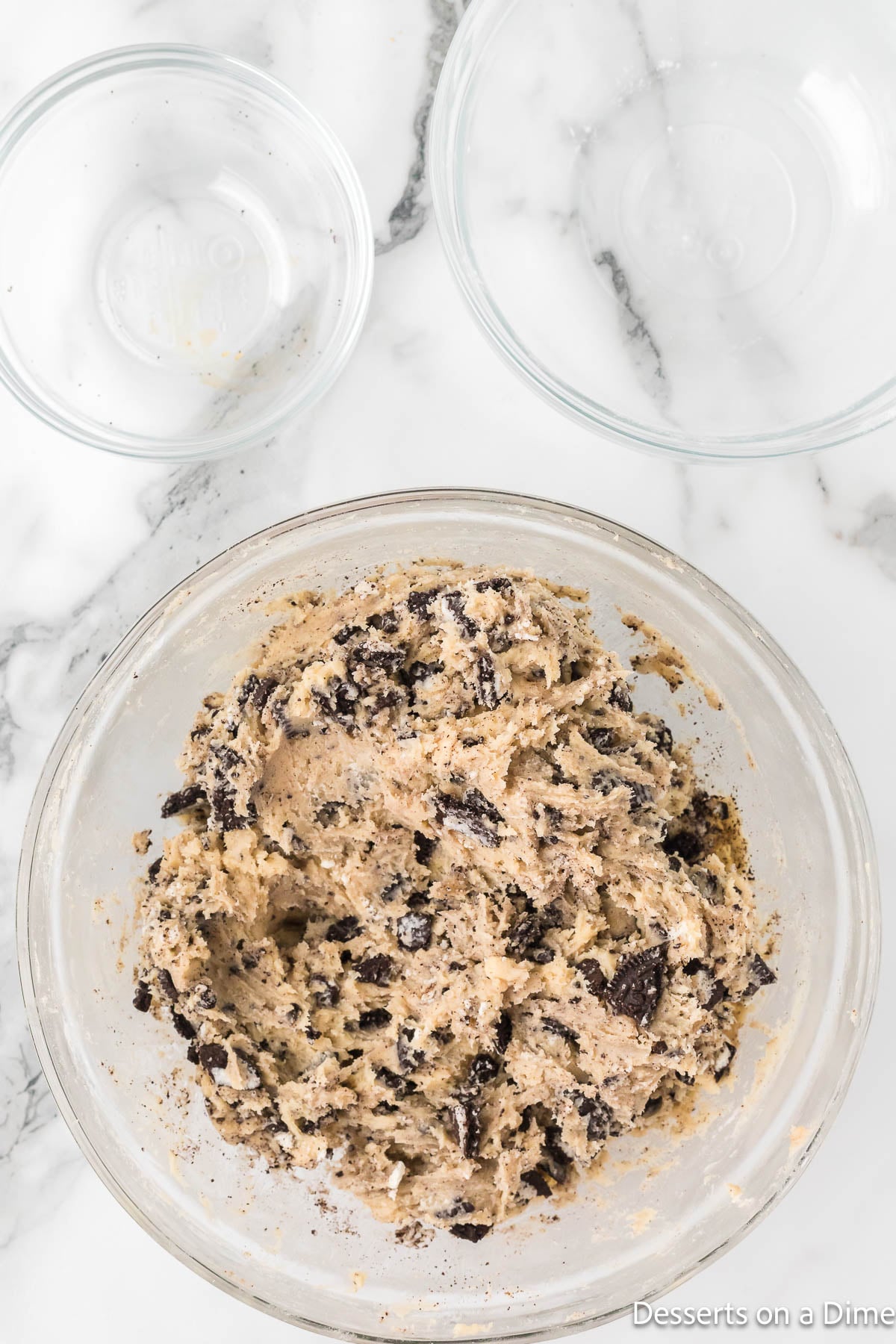 Crushed cookies folded into dough. 