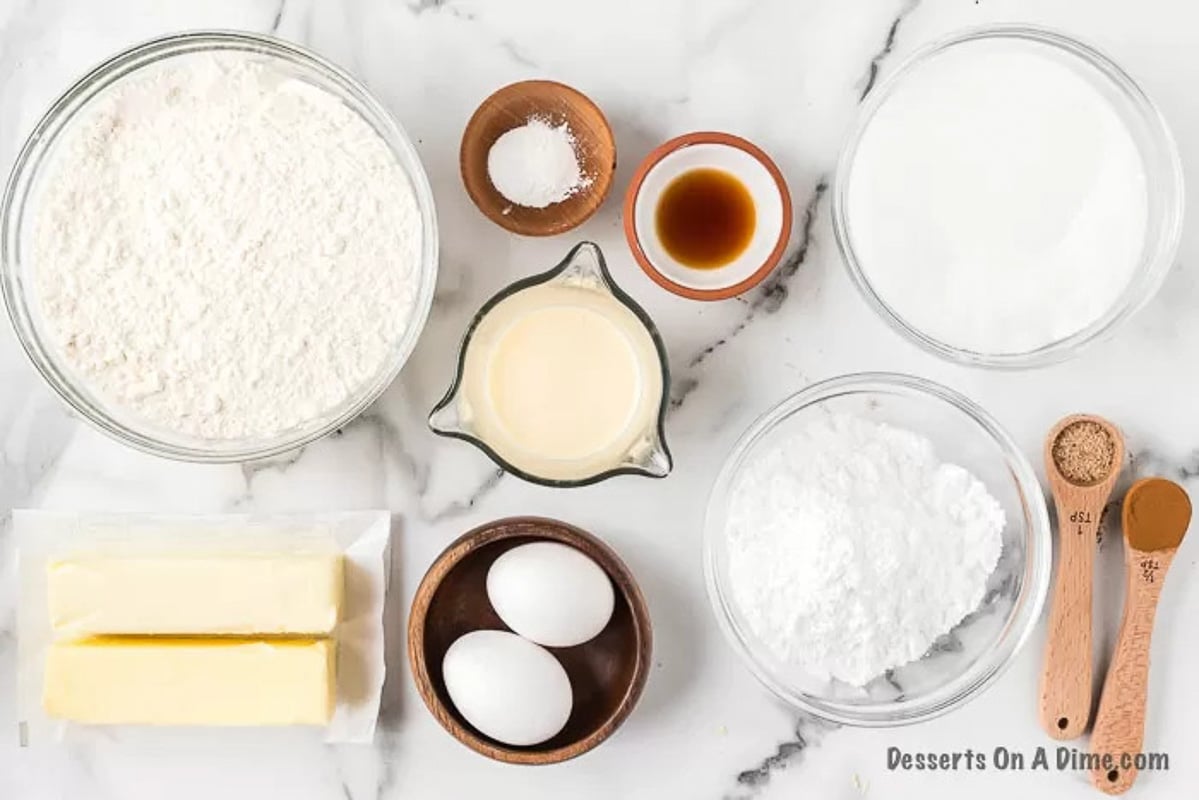 Ingredients needed - butter, white sugar, eggs, flour, baking powder, nutmeg, cinnamon, eggnog, vanilla, powdered sugar