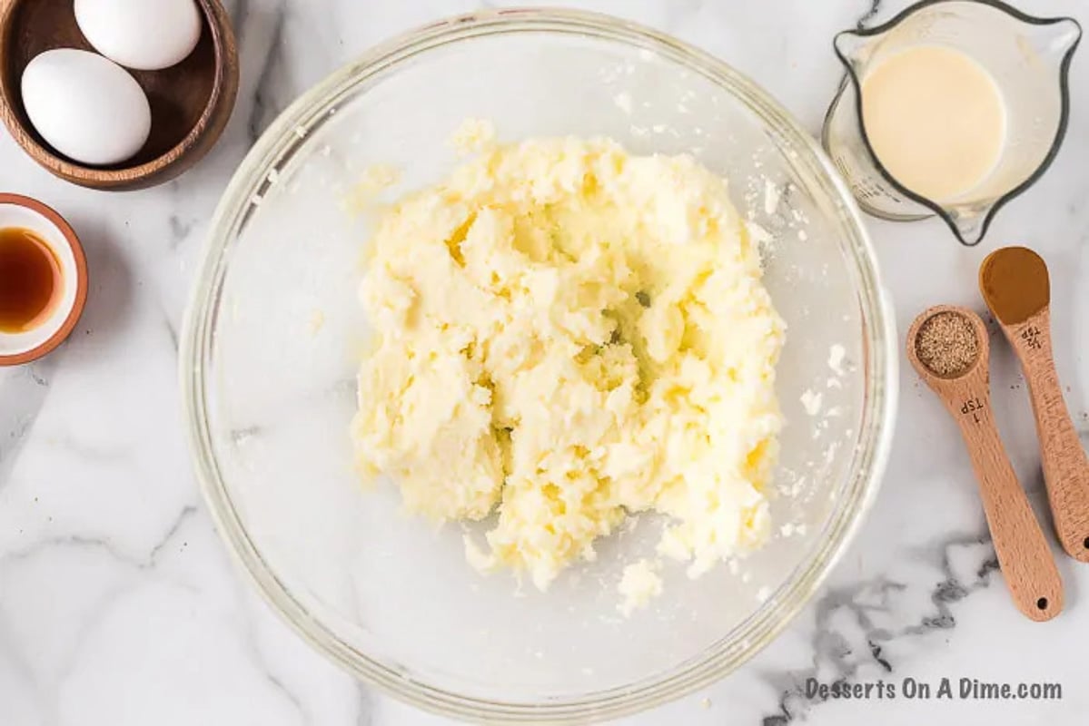 Butter and sugar in a bowl. 