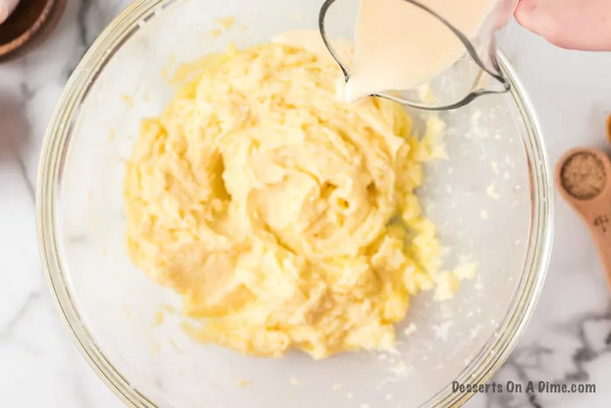 Eggnog poured into mixture. 