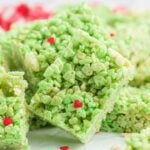Grinch rice krispie treats cut into squares.