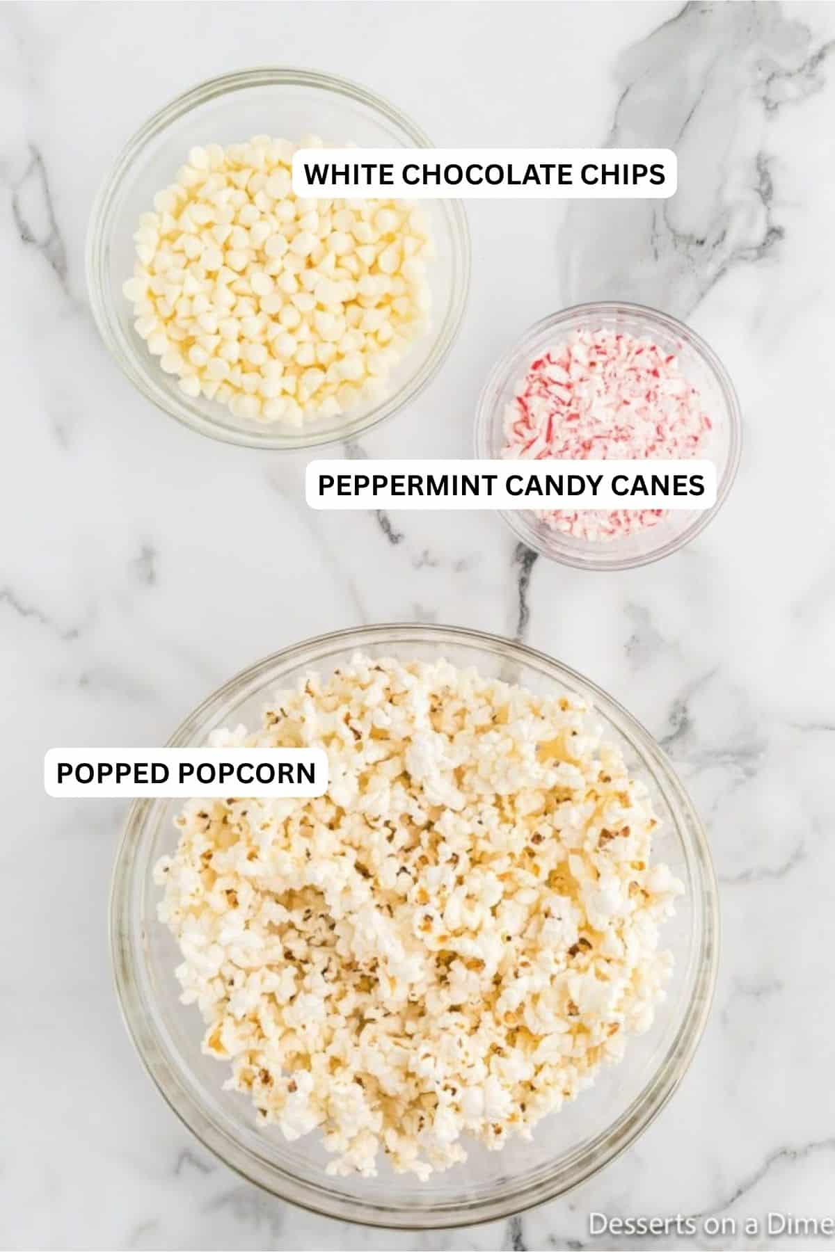 Ingredients for recipe: popcorn, white chocolate chips and candy canes.