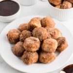 Air Fryer Donut Holes stacked together.
