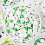 St. Patrick's Day puppy chow in a white bowl.