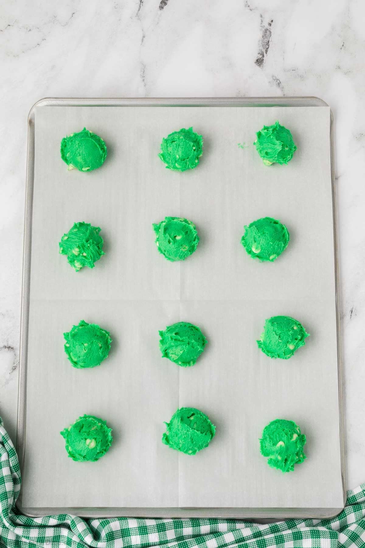 Dough scooped into balls. 