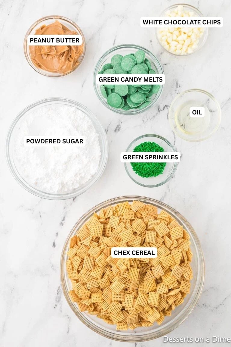 St Patricks Day Puppy Chow is the best recipe to enjoy with little work. Lots of delicious peanut butter, powdered sugar and more combine for a great treat. Ingredients for recipe: peanut butter, white chocolate chips, green candy melts, oil, powdered sugar, green sprinkles and chex cereal.