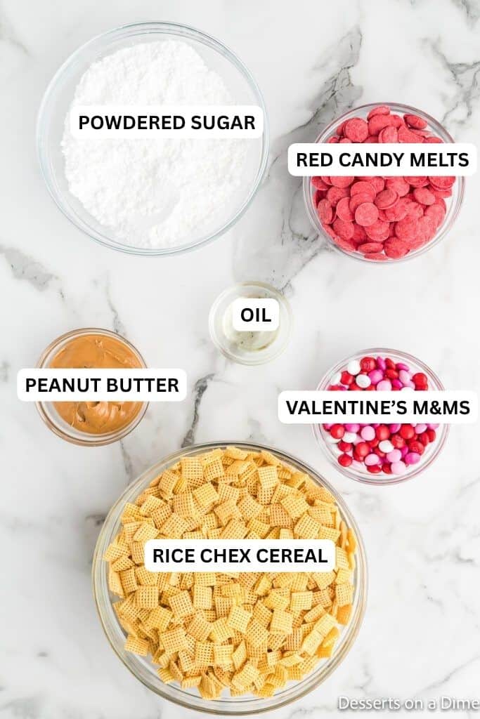 We make Valentine's Day Puppy Chow Recipe every year for a special treat. Whether you call it puppy chow or muddy buddies, this recipe is so delicious. Ingredients for recipe: powdered sugar, red candy melts, oil, peanut butter, valentine's m&ms and rice cereal.