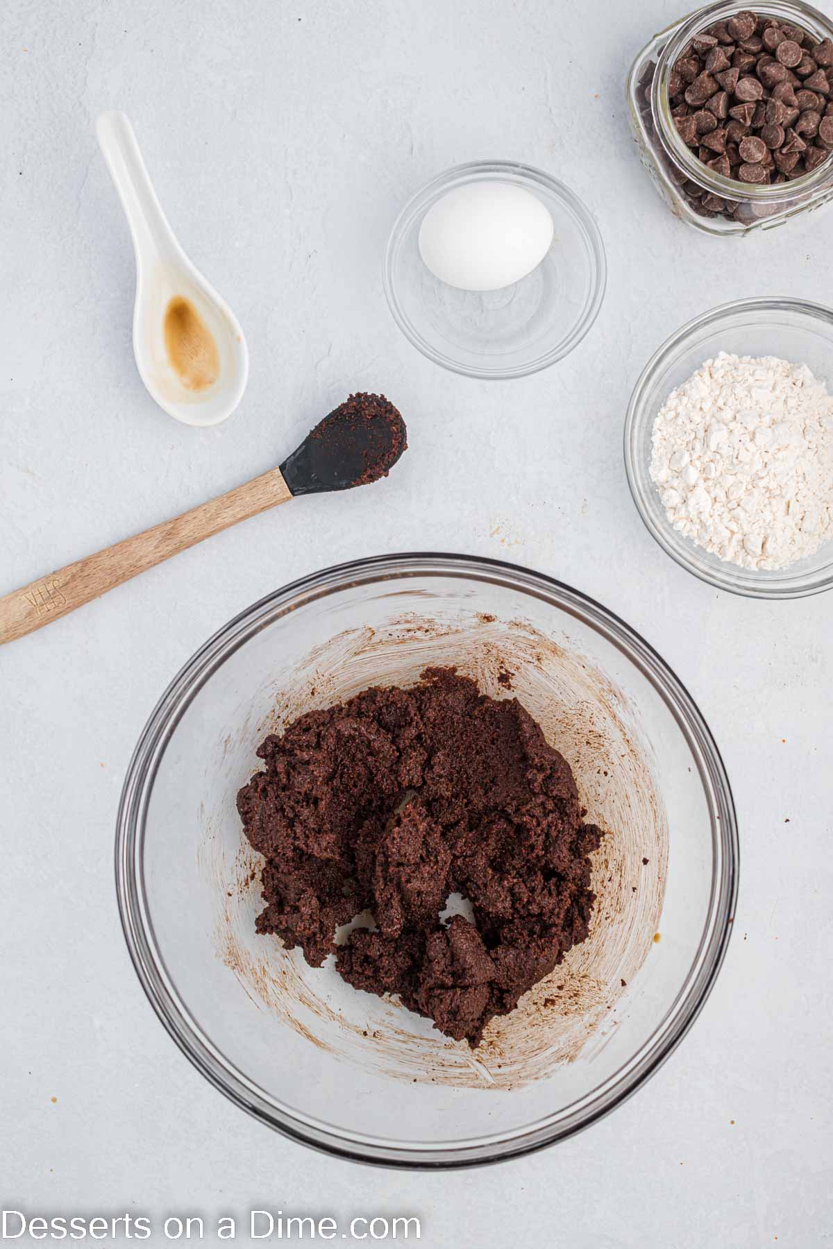 Bowl of butter, brown sugar and cocoa powder combined.