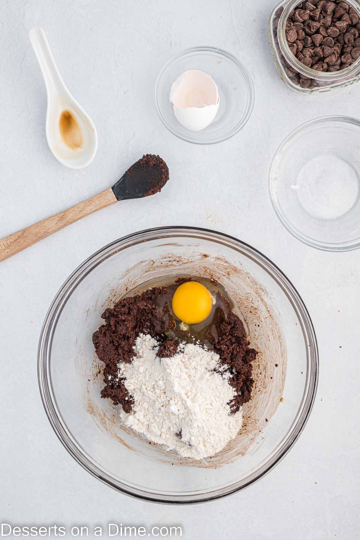 Flour and egg whisked into bowl.