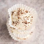 Keto Cheesecake Fat bombs in a cupcake holder stacked.